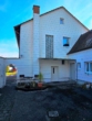 Außenansicht Rückseite - Geisenfeld! Wohnhaus mit Holzkamin, Freisitz, Nebengebäude, 2 Garagen, Keller und großem Garten!