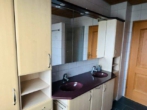 Badezimmer - Schöne großzügige 6-Zimmerwohnung mit großem Garten, Terrasse, Garage, Küche und zwei Kachelöfen!