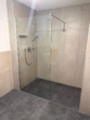 Dusche - PAF! Neubau! 2-ZKB EG-Whg. mit 11,06 m² Süd-/West-Terrasse, Garten, FBH, elekt. Rollläden., STP!