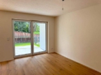 Terrasse - PAF! Neubau! 2-ZKB EG-Whg. mit 11,06 m² Süd-/West-Terrasse, Garten, FBH, elekt. Rollläden., STP!